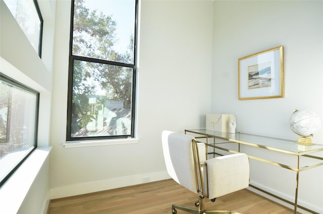 home office with light wood-type flooring