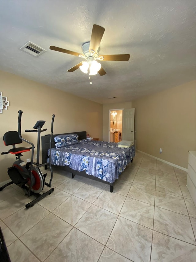 15810 Amapola Dr, Houston, TX 77083 - tiled bedroom featuring baseboards, a ceiling fan, and visible vents