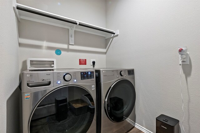 laundry area featuring separate washer and dryer