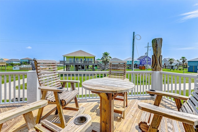 wooden deck with a yard