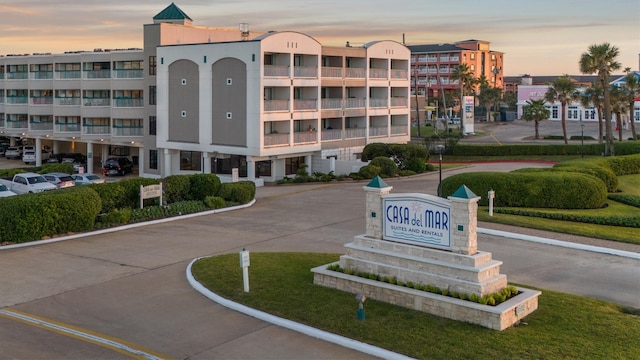 view of outdoor building at dusk