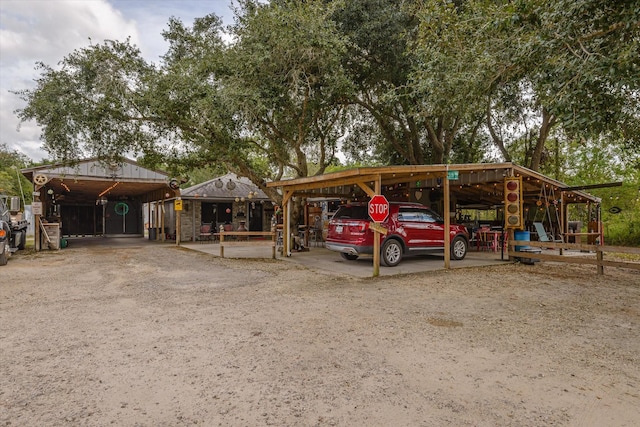 view of parking with a carport
