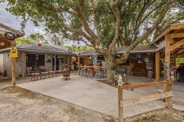 view of patio featuring a bar