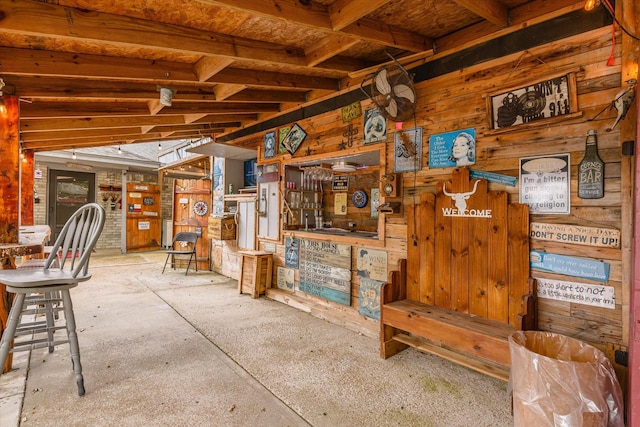 interior space featuring wood walls
