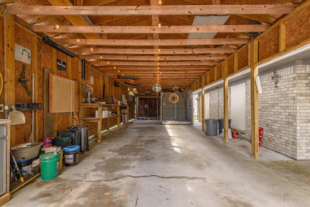 misc room featuring unfinished concrete floors