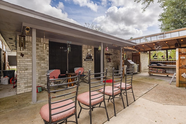 view of patio / terrace featuring a grill