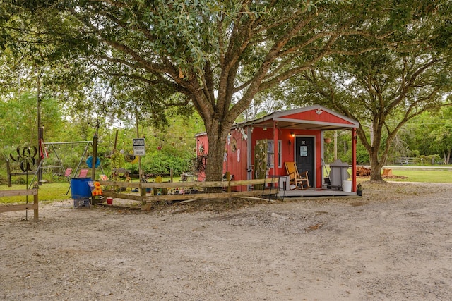 view of play area with an outbuilding