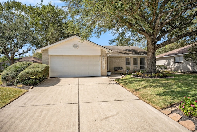 ranch-style house with a front yard and a garage