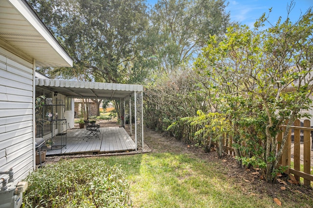 view of yard featuring a wooden deck