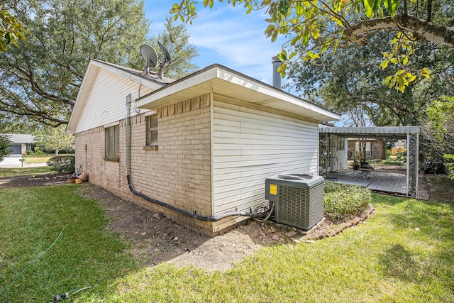 view of side of home with central air condition unit, a lawn, and a pergola