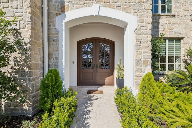 doorway to property featuring french doors