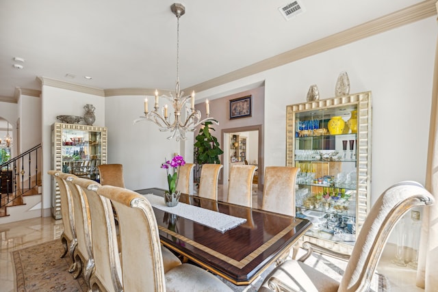 dining area featuring a notable chandelier and ornamental molding