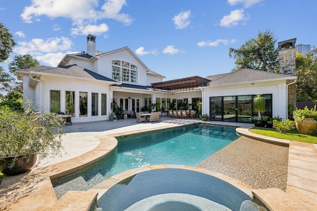 view of swimming pool featuring an in ground hot tub, an outdoor hangout area, a patio, and a pergola