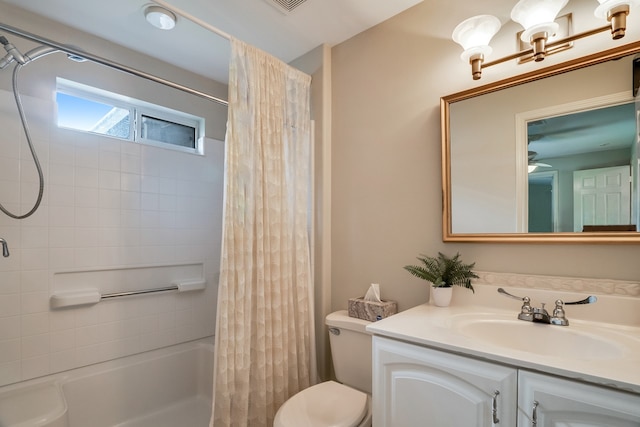 full bathroom with vanity, toilet, and shower / tub combo with curtain