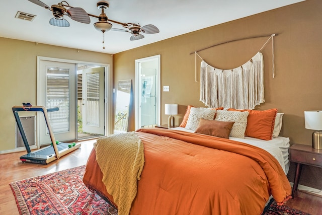 bedroom featuring ceiling fan, hardwood / wood-style flooring, and access to outside