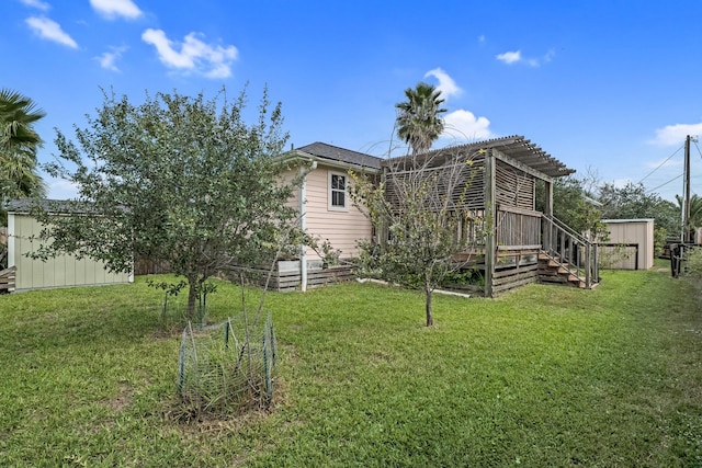 back of property featuring a yard and a storage shed