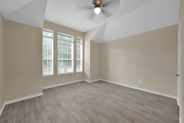 additional living space featuring ceiling fan and light wood-type flooring