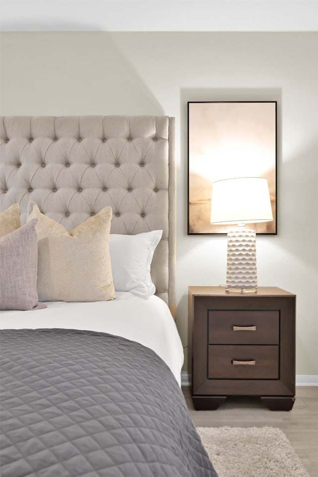 bedroom with light hardwood / wood-style floors