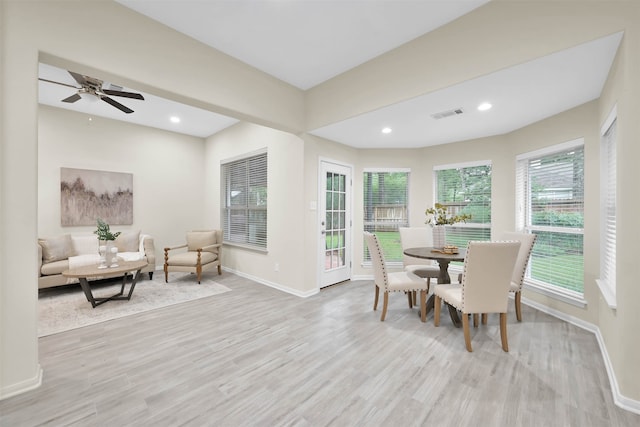 dining area featuring light hardwood / wood-style floors and ceiling fan