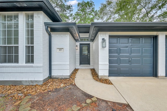 property entrance with a garage