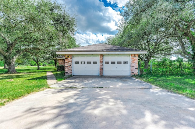 garage with a lawn