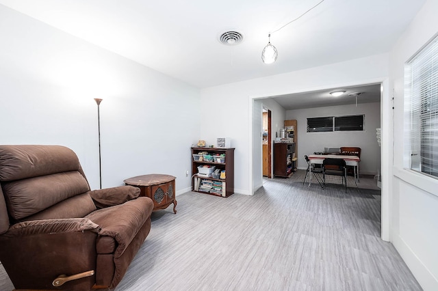 living area with light wood-type flooring