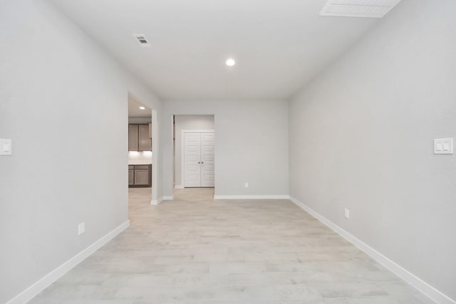 empty room featuring light hardwood / wood-style floors