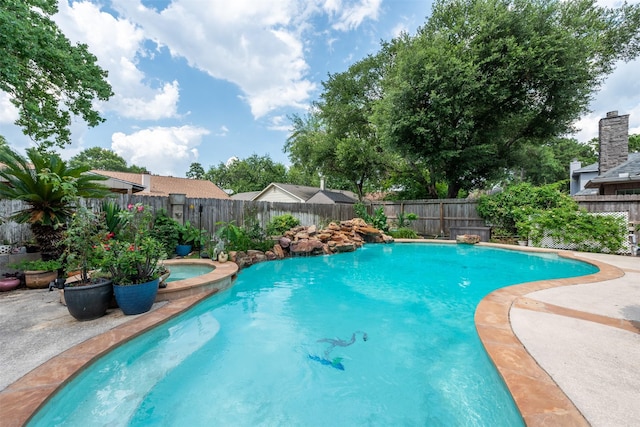 view of pool featuring a fenced in pool and a fenced backyard
