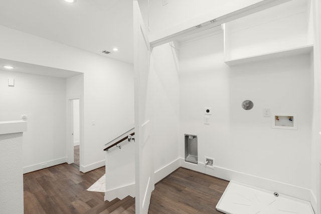 clothes washing area featuring hookup for an electric dryer, washer hookup, dark hardwood / wood-style floors, and hookup for a gas dryer