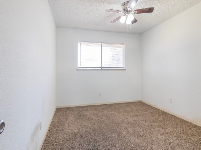 unfurnished room featuring a textured ceiling, carpet flooring, and ceiling fan