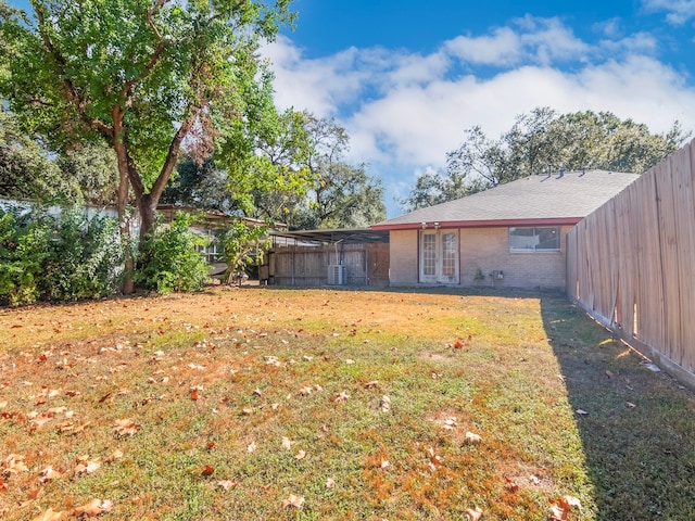 view of yard featuring central AC