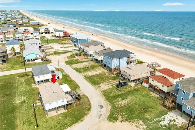 drone / aerial view with a view of the beach and a water view