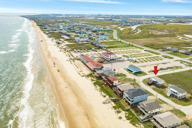 aerial view featuring a water view and a view of the beach