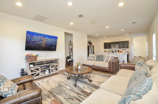 living room featuring wood-type flooring