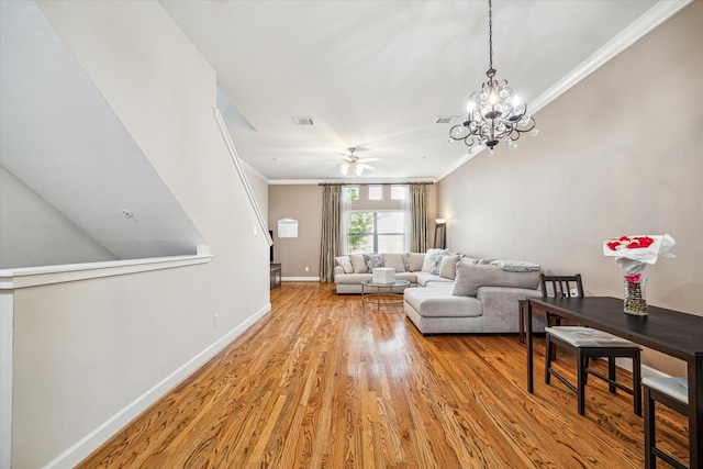 living room featuring crown molding, ceiling fan with notable chandelier, and light wood-type flooring