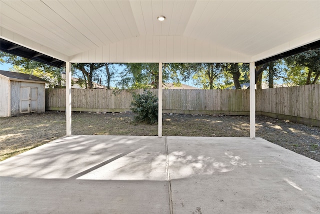 view of patio / terrace with a storage shed