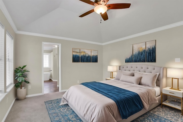 bedroom with ceiling fan, ornamental molding, ensuite bathroom, and light colored carpet