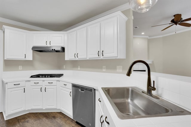 kitchen featuring dishwasher, white cabinets, sink, and dark hardwood / wood-style floors