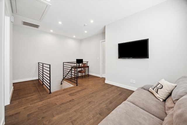 living room with dark hardwood / wood-style floors