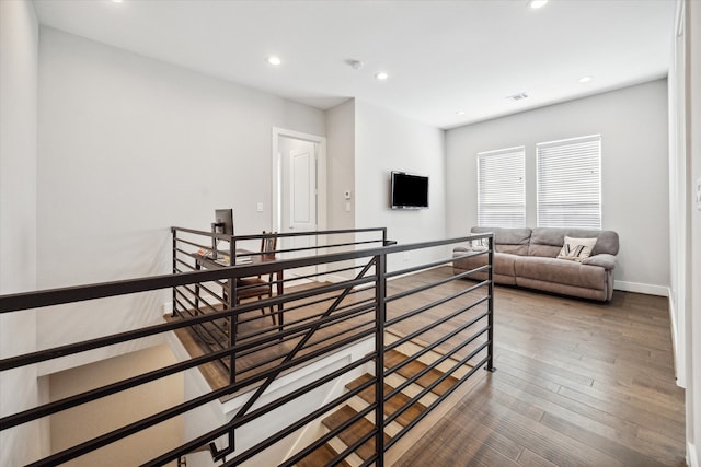 interior space with hardwood / wood-style floors