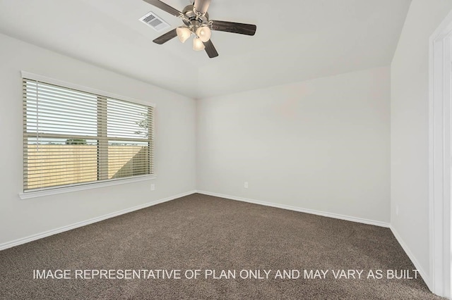 carpeted spare room with ceiling fan