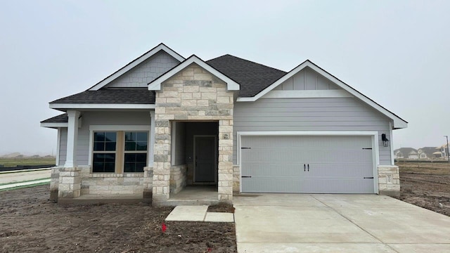 craftsman house featuring a garage