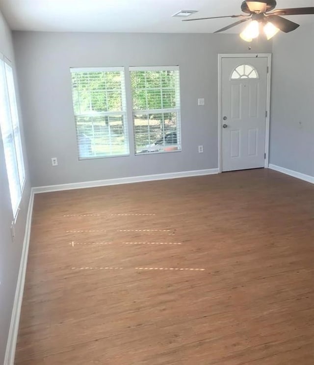 entryway featuring hardwood / wood-style flooring and ceiling fan