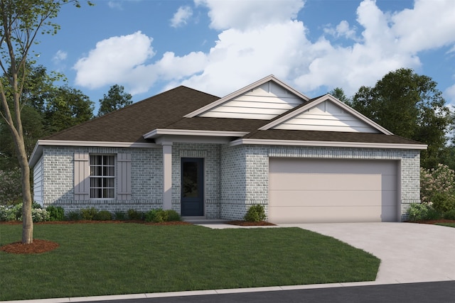 view of front facade featuring a front lawn and a garage