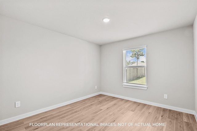 unfurnished room featuring light hardwood / wood-style flooring