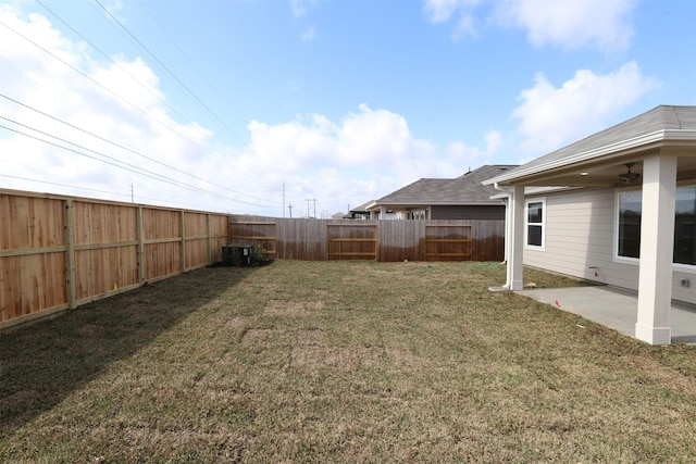 view of yard with a patio and a fenced backyard