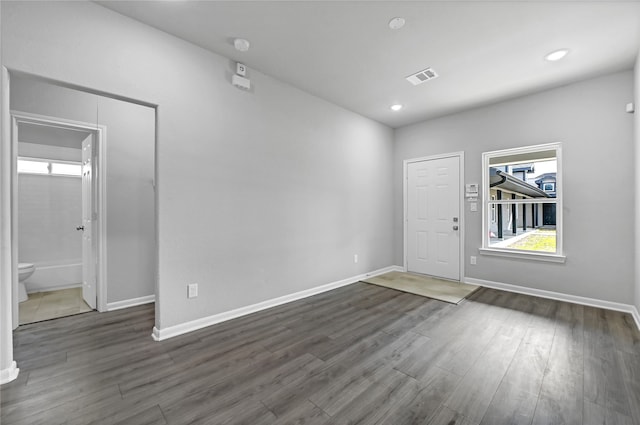 foyer with dark wood-type flooring