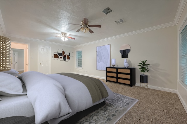 carpeted bedroom featuring crown molding, a textured ceiling, and ceiling fan