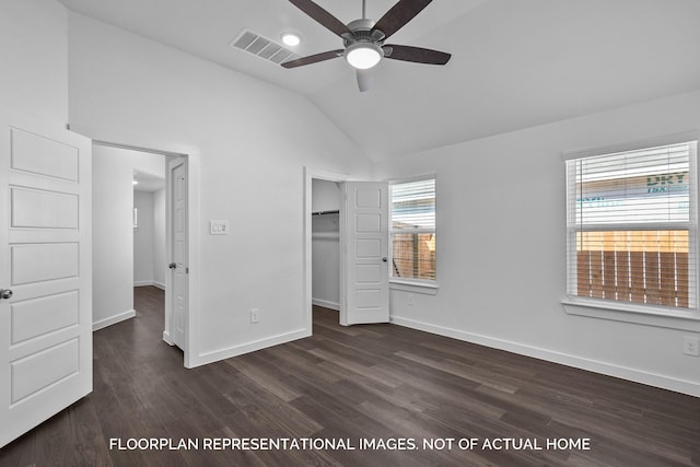 unfurnished bedroom with ceiling fan, dark hardwood / wood-style floors, a closet, and lofted ceiling