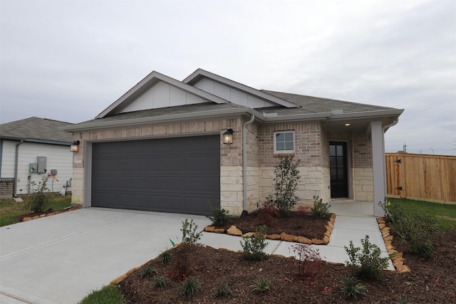 ranch-style house with concrete driveway, brick siding, board and batten siding, and an attached garage